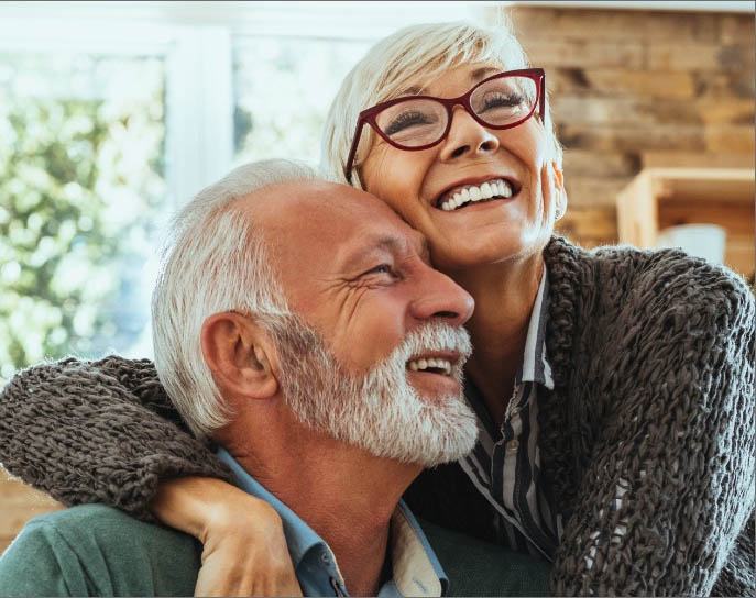 Older man and woman smiling