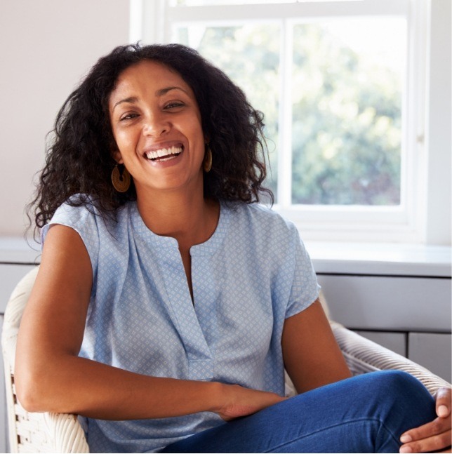 Woman smiling in chair