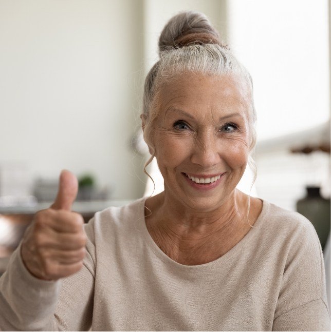 Woman giving thumbs up