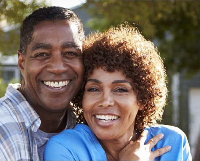 Man and woman with healthy smiles