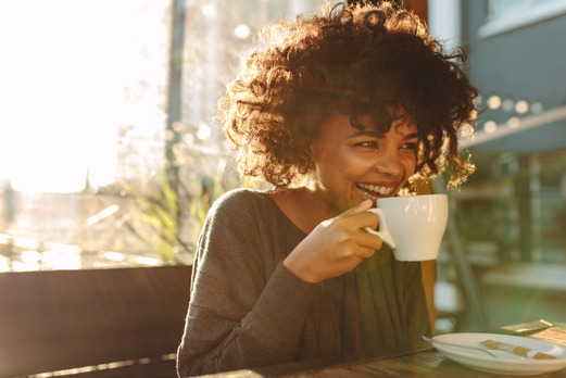 closeup of woman drinking coffee